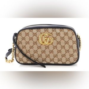 A beautiful Authentic Gucci GG Marmont Shoulder Bag Diagonal Quilted GG Small